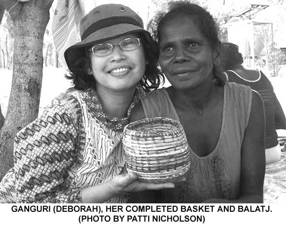 Ganguri and her completed basket