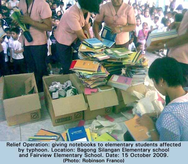Giving Notebooks to Elementary Students